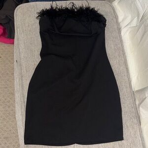 Elegant Black Strapless Dress with Feather Detail